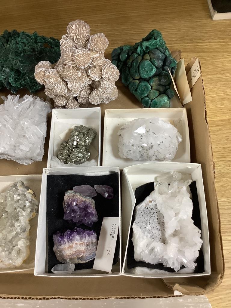 A group of mineral specimens, including two malachite specimens